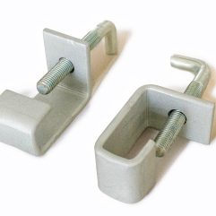 Scaffold board clamps fasten two scaffold boards together.